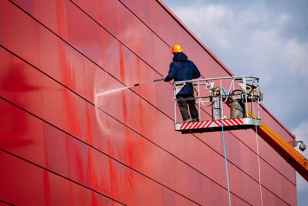 Industrial Pressure washing job with chemical overspray