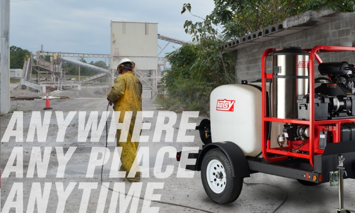 Industrial pressure washer trailer unit cleaning equipment at a worksite